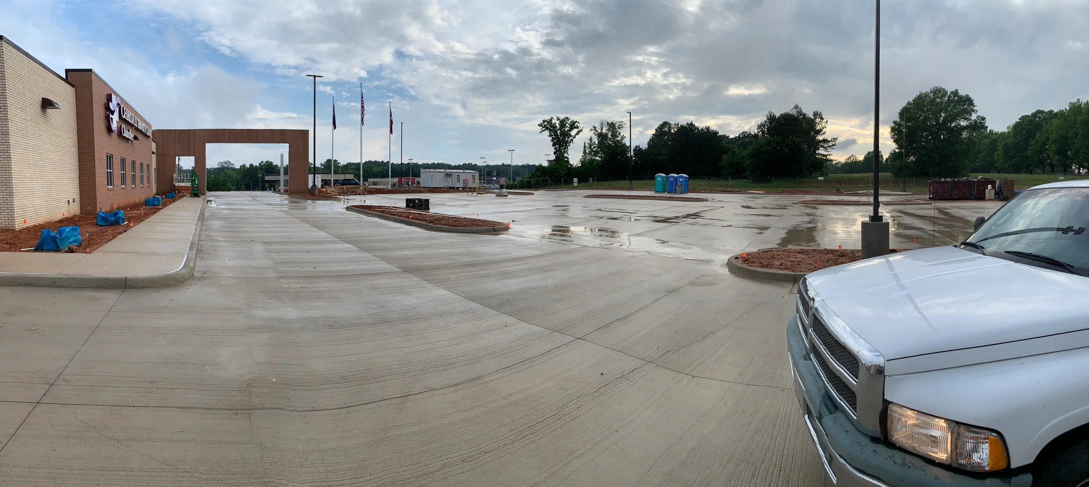 Cleaned concrete lot near a commercial building