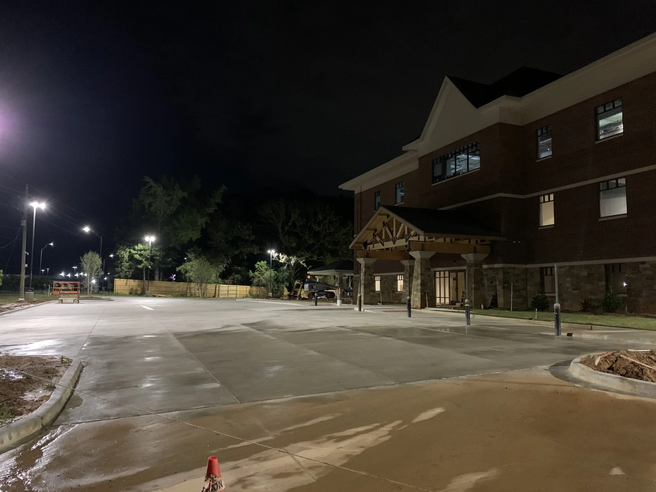 Commercial concrete freshly cleaned at night